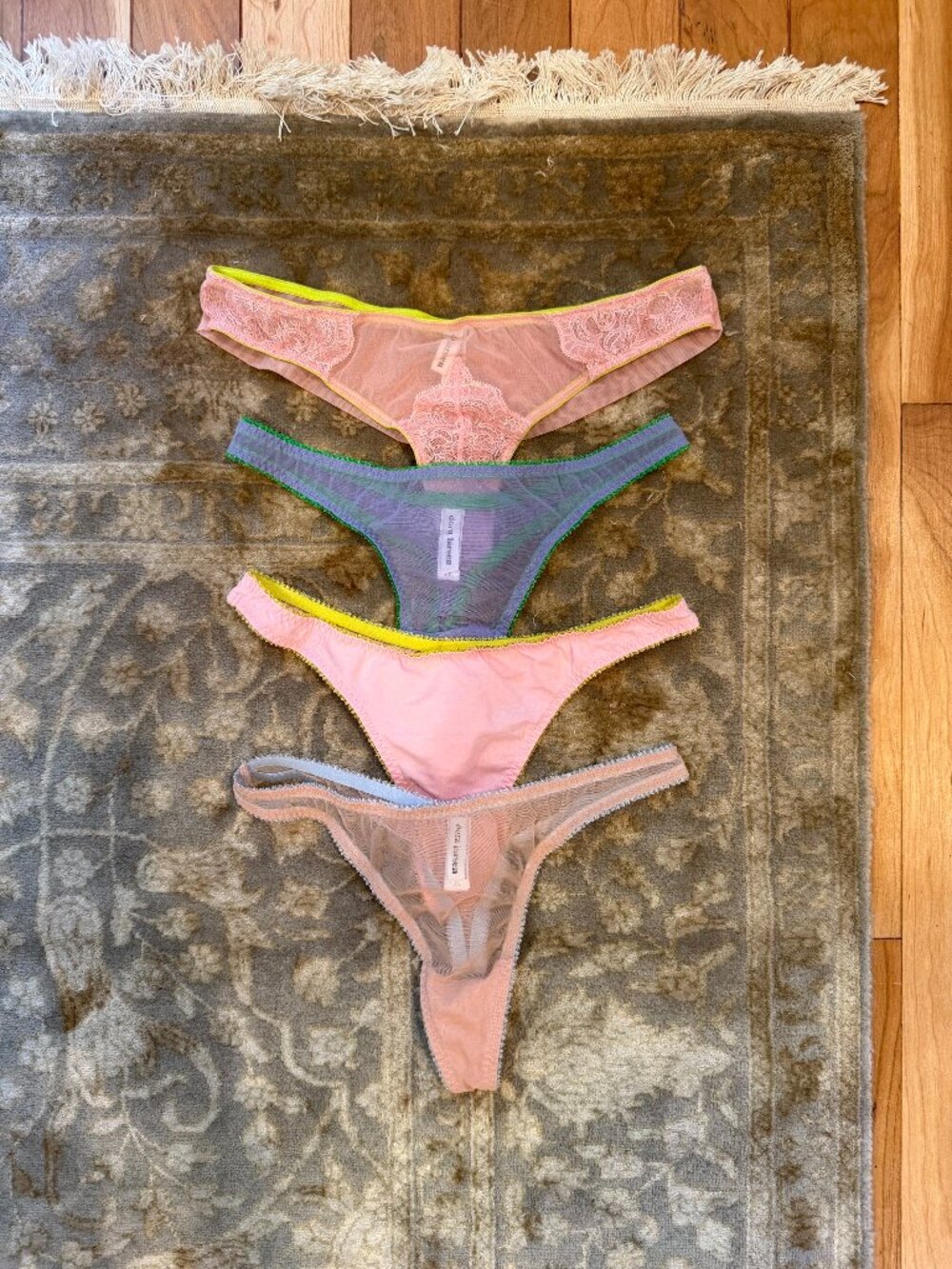 Four Dora Larsen thongs